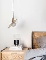 saturn-modern-celestial-sphere-pendant-light-with-swiveling-brass-ring-and-opal-glass-shade