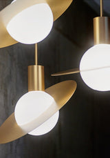 saturn-modern-celestial-sphere-pendant-light-with-swiveling-brass-ring-and-opal-glass-shade