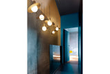 saturn-modern-celestial-sphere-pendant-light-with-swiveling-brass-ring-and-opal-glass-shade
