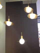 saturn-modern-celestial-sphere-pendant-light-with-swiveling-brass-ring-and-opal-glass-shade