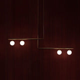 modern-geometric-satellite-pendant-light-with-opal-glass-globes-and-adjustable-brass-arms