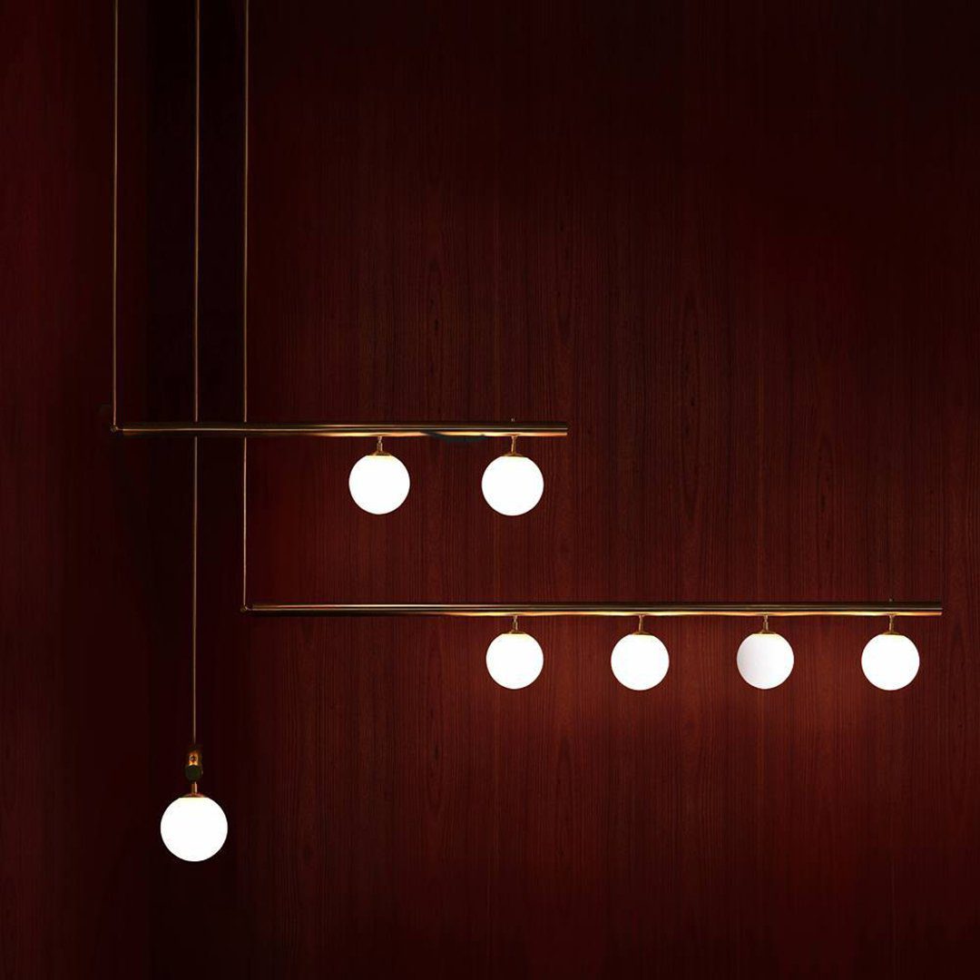 modern-geometric-satellite-pendant-light-with-opal-glass-globes-and-adjustable-brass-arms