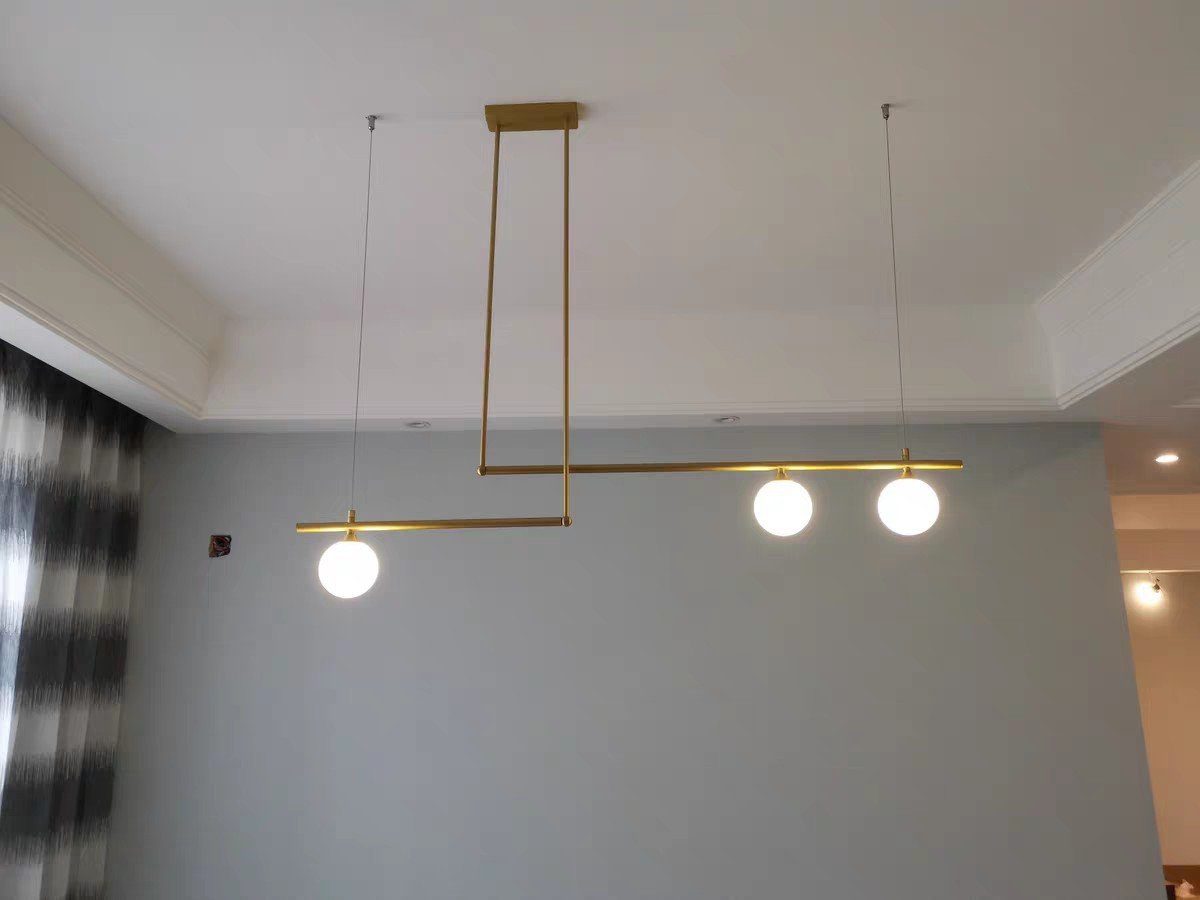 modern-geometric-satellite-pendant-light-with-opal-glass-globes-and-adjustable-brass-arms