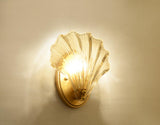 elegant-shell-shaped-brass-and-amber-glass-wall-lamp-for-modern-home-decor