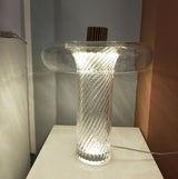 modern-vintage-blown-glass-led-table-lamp-with-brass-base-and-integrated-lighting