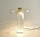 modern-vintage-blown-glass-led-table-lamp-with-brass-base-and-integrated-lighting