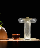 modern-vintage-blown-glass-led-table-lamp-with-brass-base-and-integrated-lighting