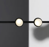 typography-cilon-disc-minimalist-led-pendant-lamp-sculptural-vertical-lighting-for-modern-living-space