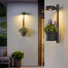 Solar Powered Outdoor Wall Sconce with Integrated Planter Black Stainless Steel LED Exterior Light