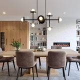 Strada Modern Starburst Chandelier with White Glass Globes and Metal Frame