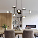 Strada Modern Starburst Chandelier with White Glass Globes and Metal Frame