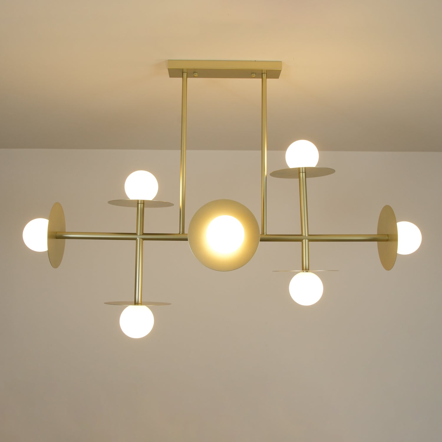 Strada Modern Starburst Chandelier with White Glass Globes and Metal Frame