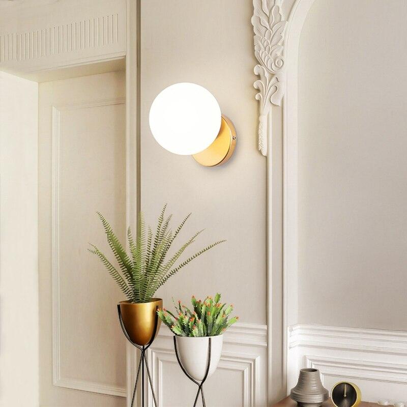 Tip of the Tongue Modern Glass Globe Wall Sconce Gold Finish Indoor Sconce Set of 2