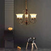 Vintage 5 Light Bending Metal Chandelier with Inverted Glass Shades and Bronze Finish