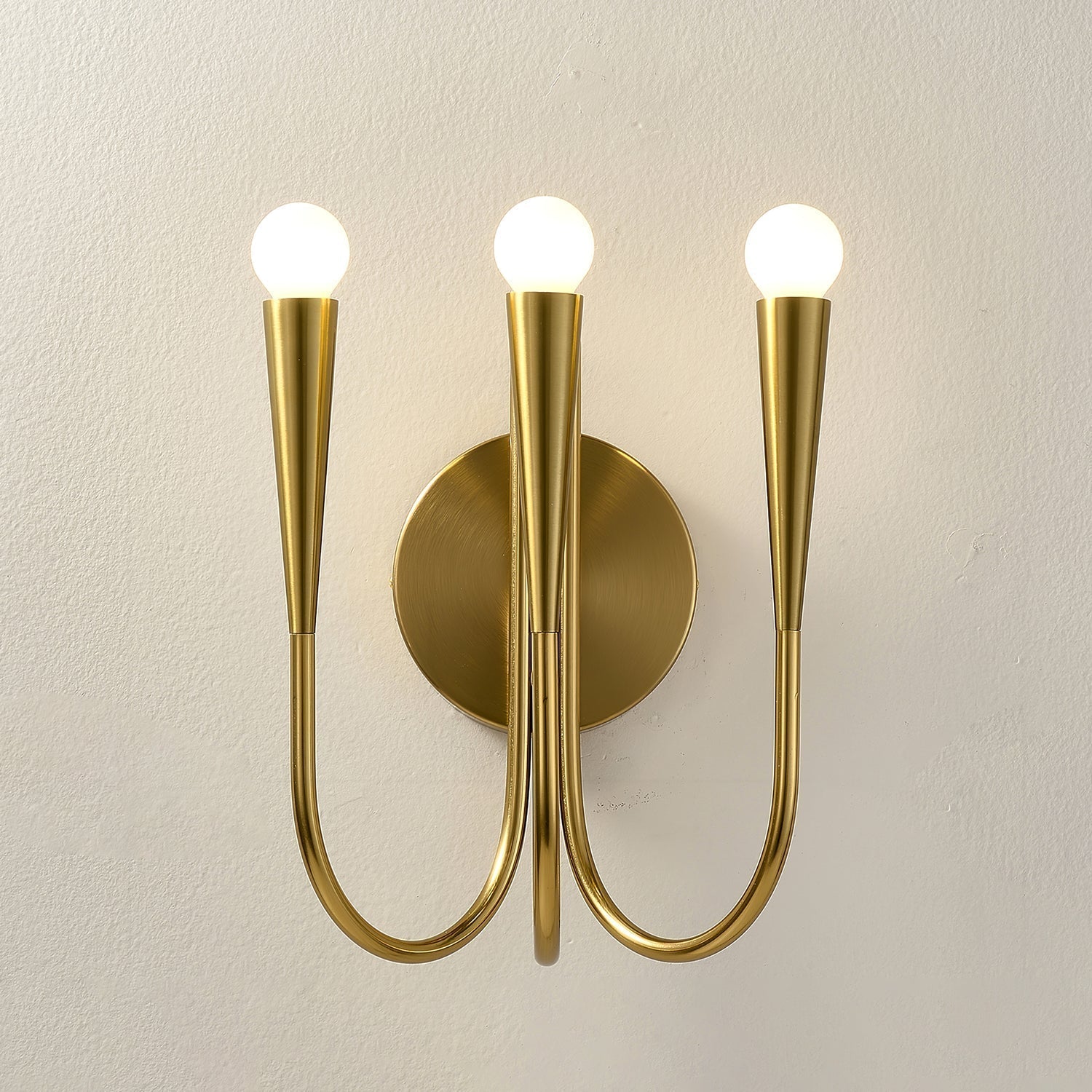 Vintage Curved Swoop Arm Wall Sconce with Clear Glass Globe Shade and Metal Finish