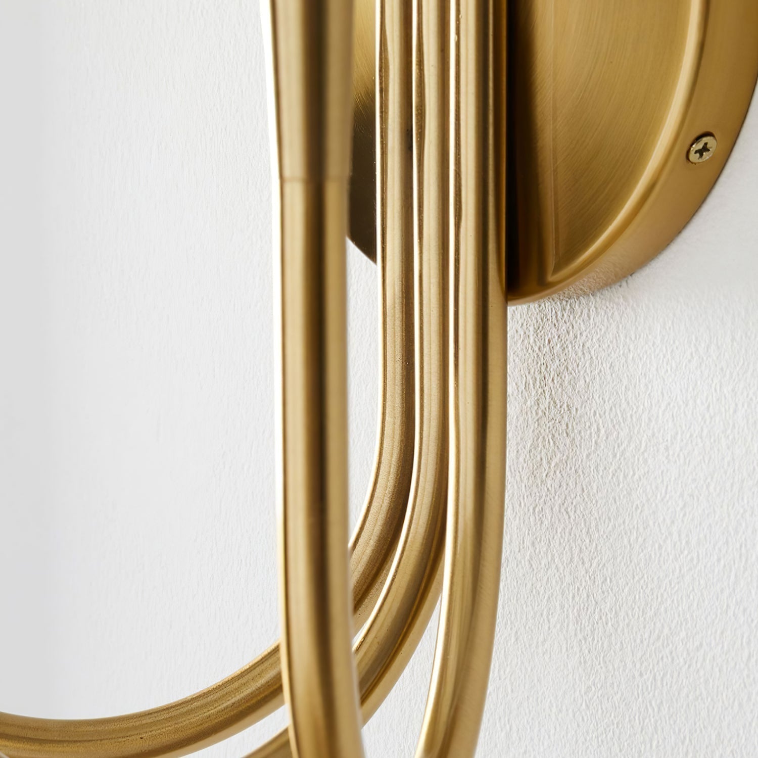 Vintage Curved Swoop Arm Wall Sconce with Clear Glass Globe Shade and Metal Finish