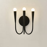 Vintage Curved Swoop Arm Wall Sconce with Clear Glass Globe Shade and Metal Finish
