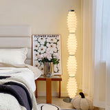 sinuous-sculptural-glass-led-floor-lamp-silver-finish-for-modern-living-room-interior-decor