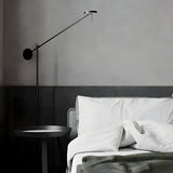 Modern Black LED Floor Lamp with Adjustable Arm and Slim Minimalist Design for Reading