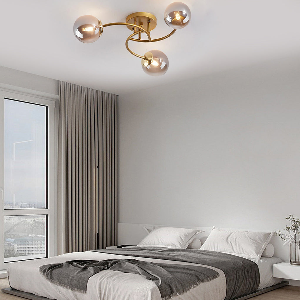 Modern Swirled Metal Flush Mount Light with Elegant Glass Globes for Ambient Bedroom Lighting