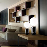 Modern Glass Globe Table Lamp with Polished Metal Frame for Modern Ambient Lighting