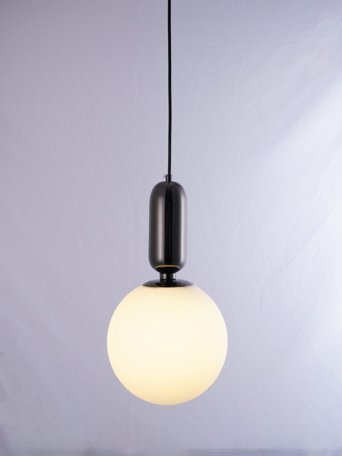 modern-spherical-glass-pendant-light-with-polished-metal-accents-for-luxury-interiors