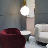 modern-spherical-glass-pendant-light-with-polished-metal-accents-for-luxury-interiors