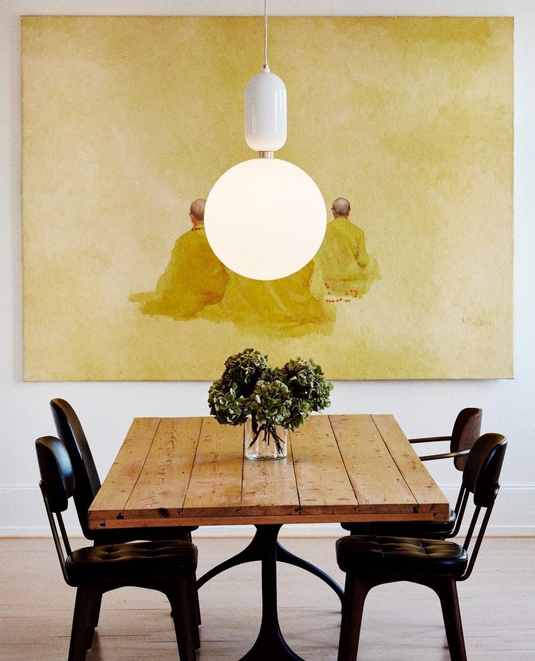 modern-spherical-glass-pendant-light-with-polished-metal-accents-for-luxury-interiors