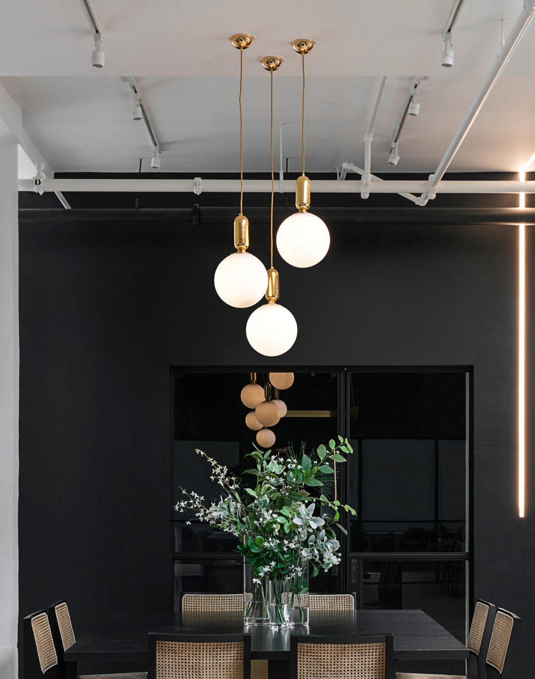 modern-spherical-glass-pendant-light-with-polished-metal-accents-for-luxury-interiors