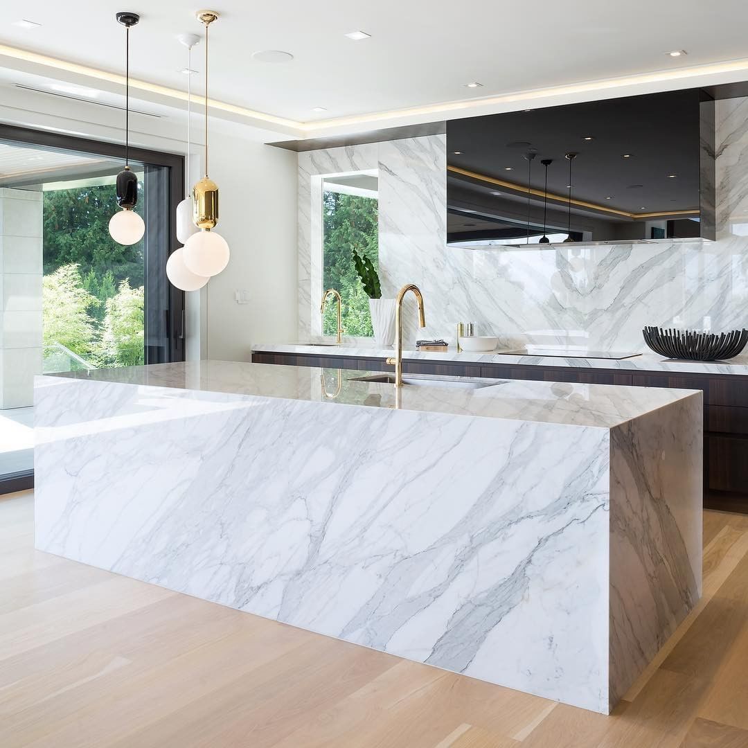 modern-spherical-glass-pendant-light-with-polished-metal-accents-for-luxury-interiors