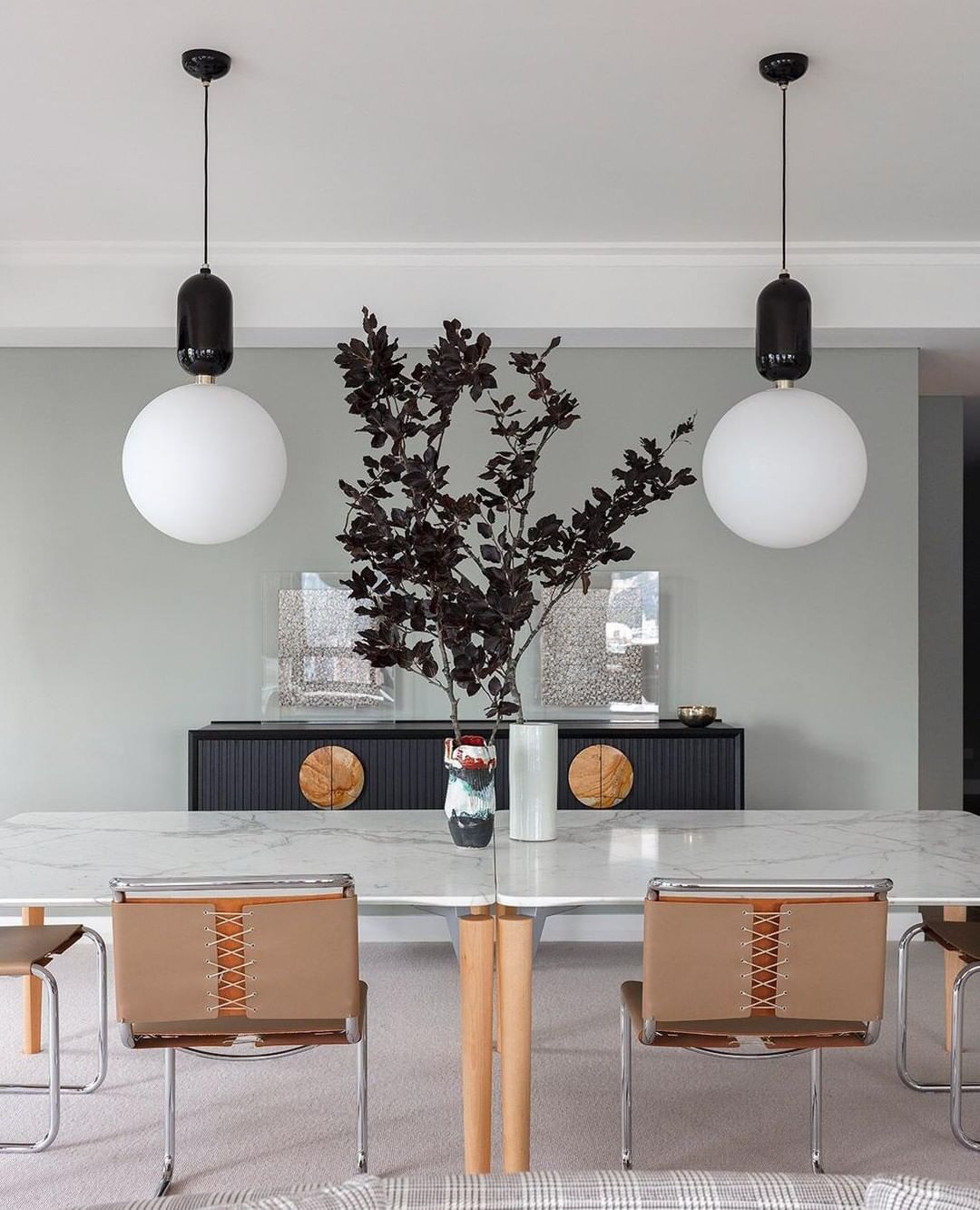 modern-spherical-glass-pendant-light-with-polished-metal-accents-for-luxury-interiors