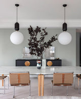 modern-spherical-glass-pendant-light-with-polished-metal-accents-for-luxury-interiors
