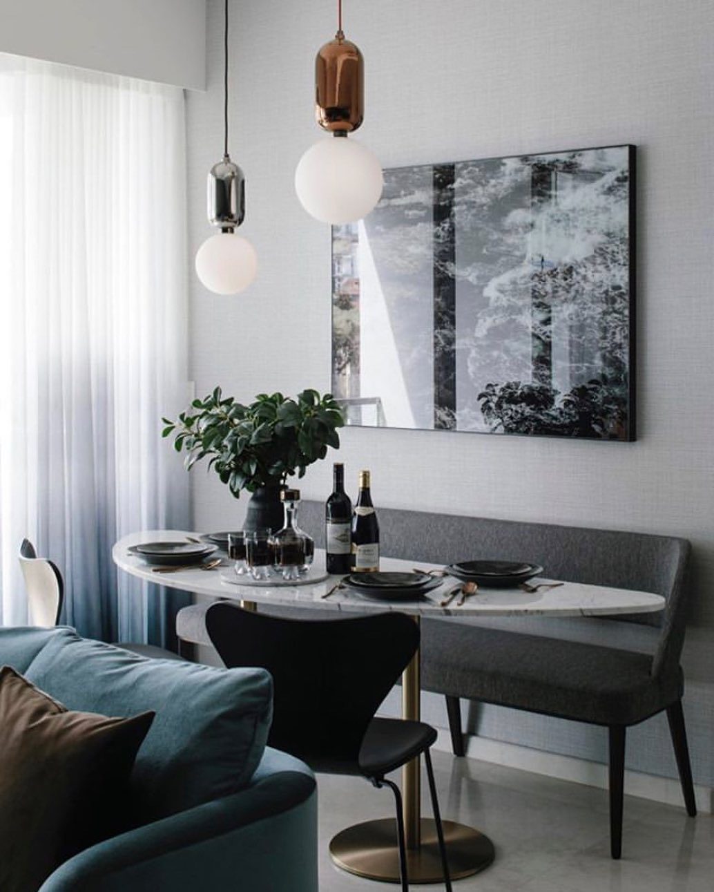modern-spherical-glass-pendant-light-with-polished-metal-accents-for-luxury-interiors
