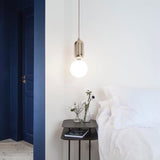 modern-spherical-glass-pendant-light-with-polished-metal-accents-for-luxury-interiors