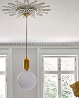 modern-spherical-glass-pendant-light-with-polished-metal-accents-for-luxury-interiors
