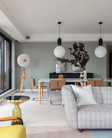 modern-spherical-glass-pendant-light-with-polished-metal-accents-for-luxury-interiors