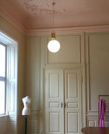 modern-spherical-glass-pendant-light-with-polished-metal-accents-for-luxury-interiors