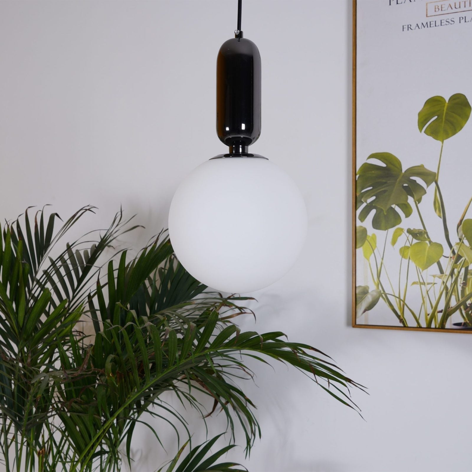 modern-spherical-glass-pendant-light-with-polished-metal-accents-for-luxury-interiors