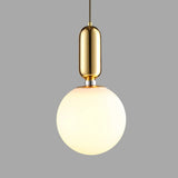 modern-spherical-glass-pendant-light-with-polished-metal-accents-for-luxury-interiors
