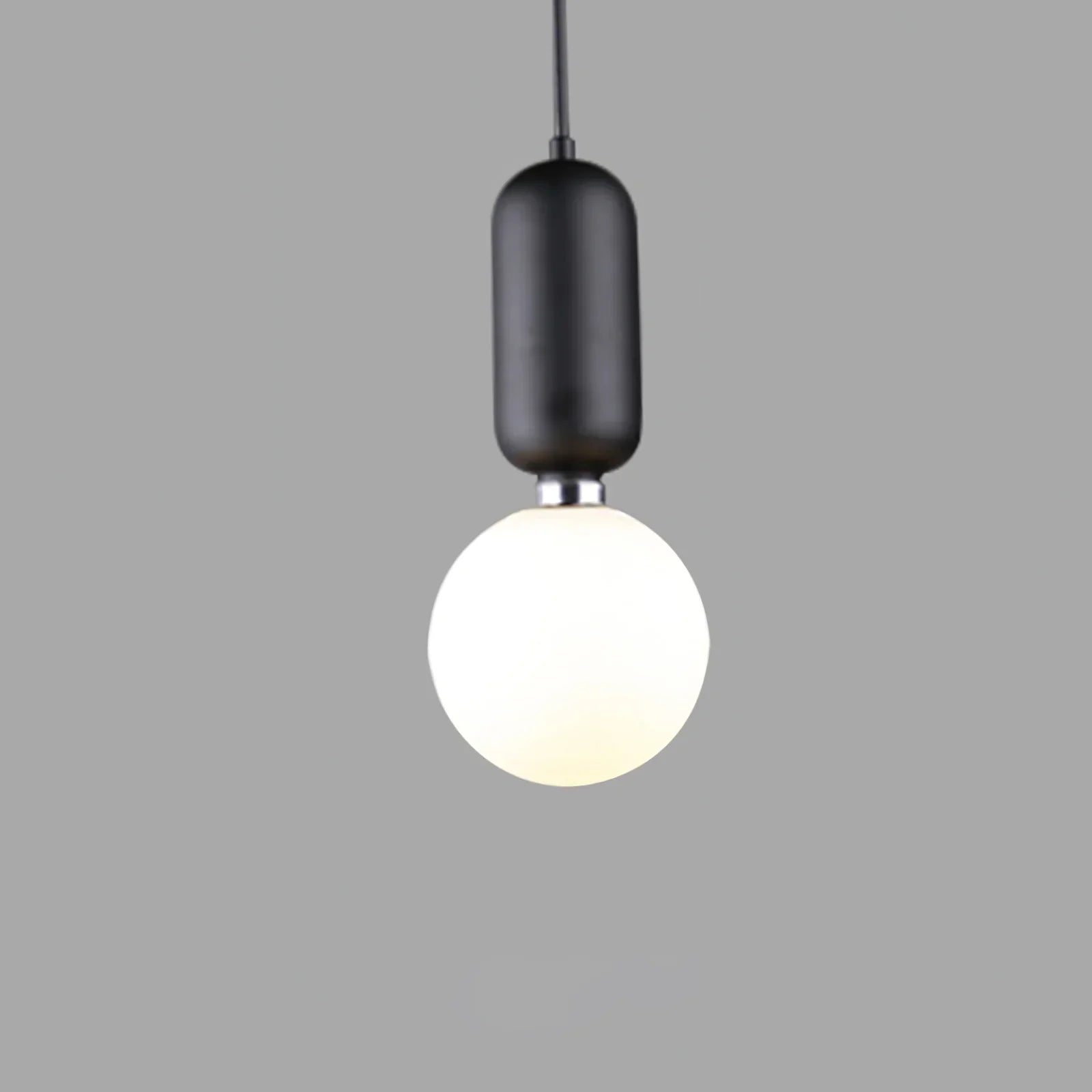 modern-spherical-glass-pendant-light-with-polished-metal-accents-for-luxury-interiors