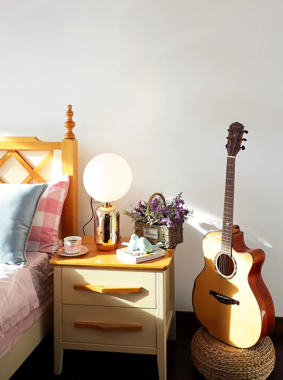 Modern Glass Globe Table Lamp with Polished Metal Frame for Modern Ambient Lighting