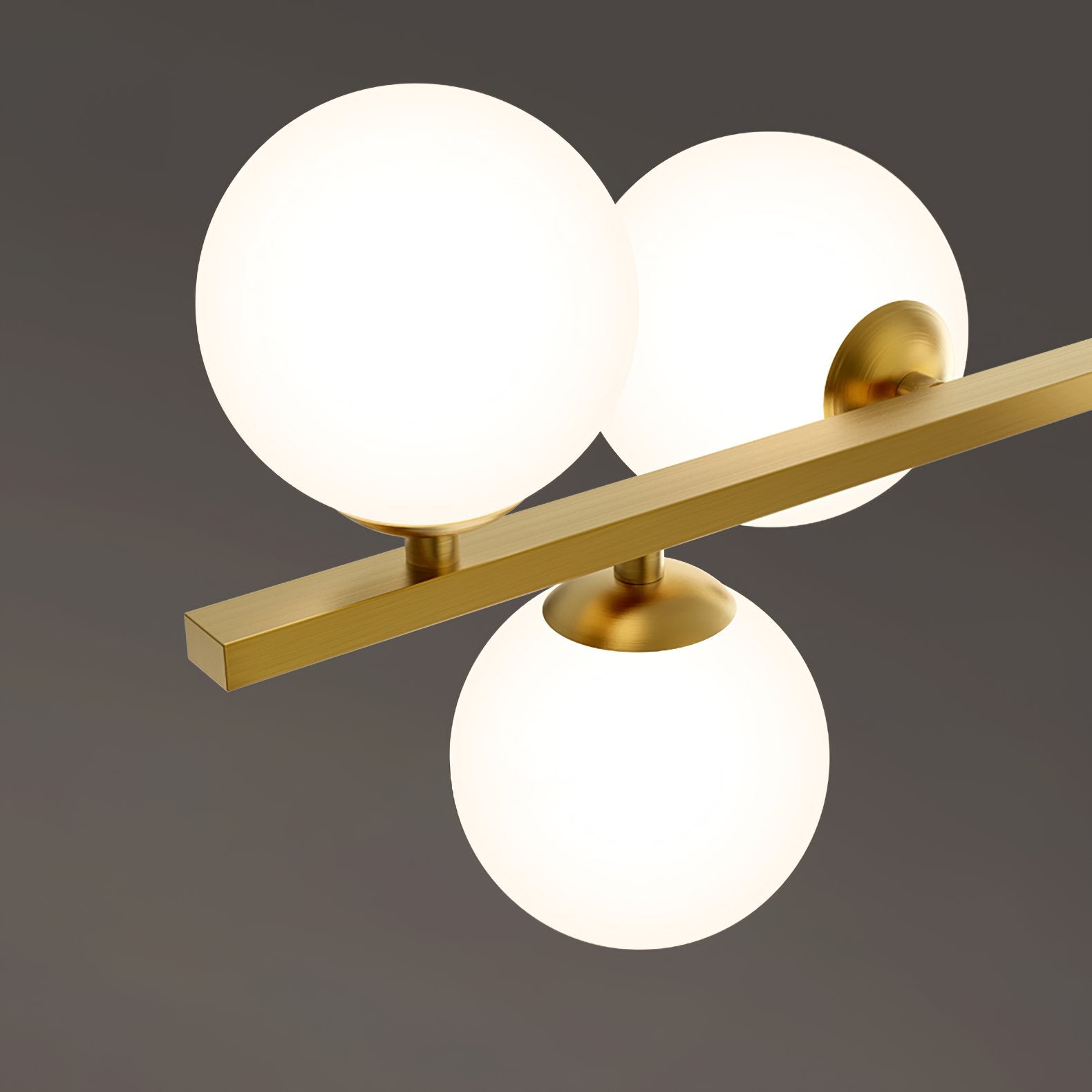modern-brass-led-linear-chandelier-with-white-glass-spheres-for-restaurant-and-dining-room
