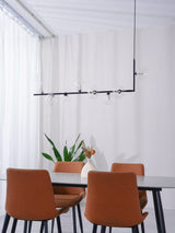 modern-linear-chandelier-with-clear-glass-globe-shades-for-geometric-dining-room-lighting