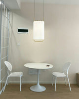 modern-geometric-pendant-light-with-white-fabric-cylindrical-shade-and-gold-metal-finish
