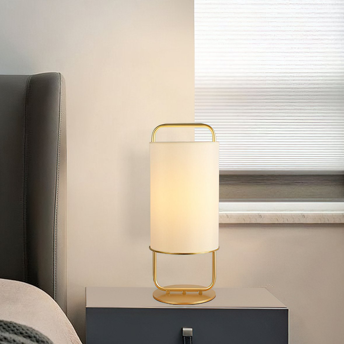 modern-minimalist-geometric-table-lamp-with-white-cloth-shade-and-gold-metal-base-for-elegant-interiors