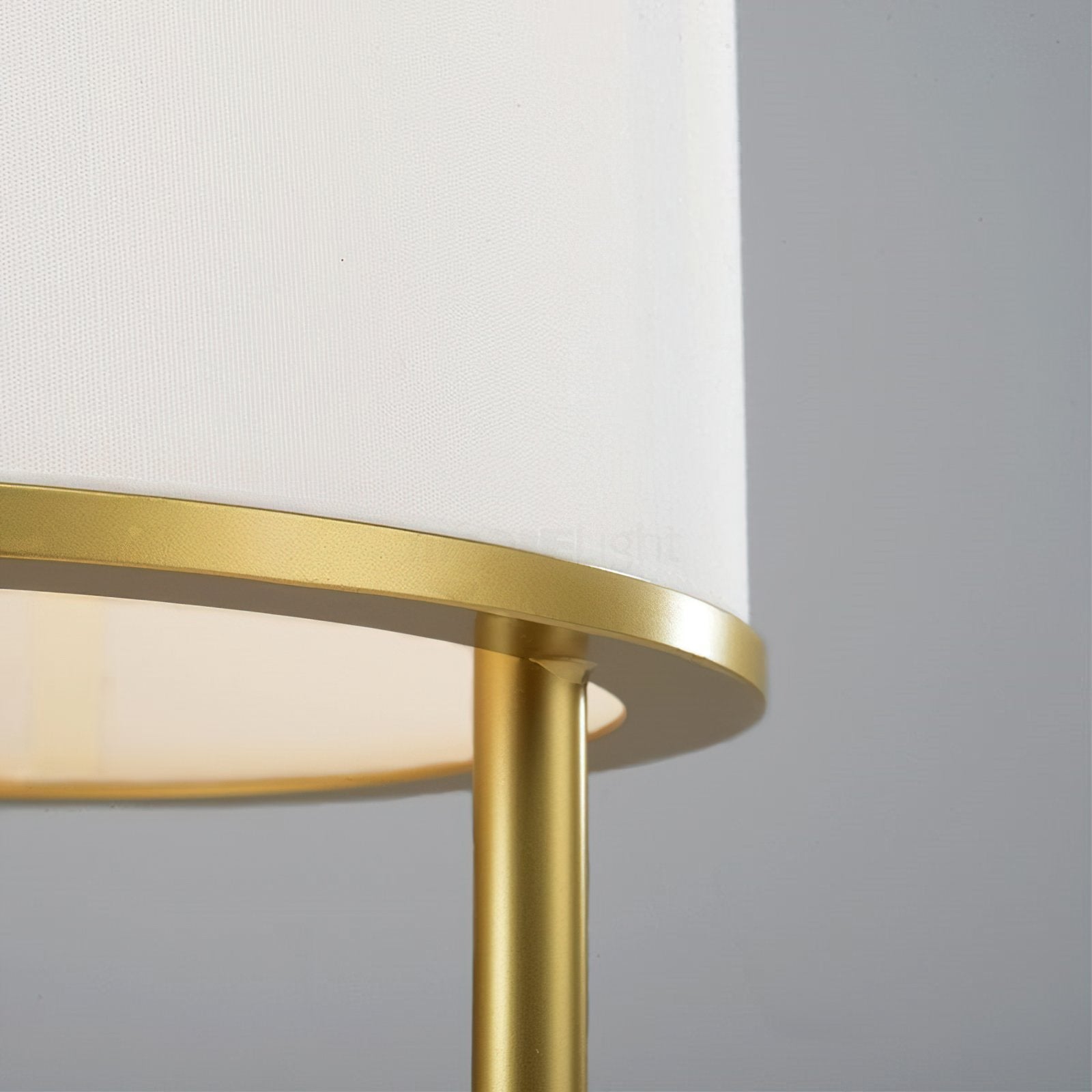 modern-minimalist-geometric-table-lamp-with-white-cloth-shade-and-gold-metal-base-for-elegant-interiors