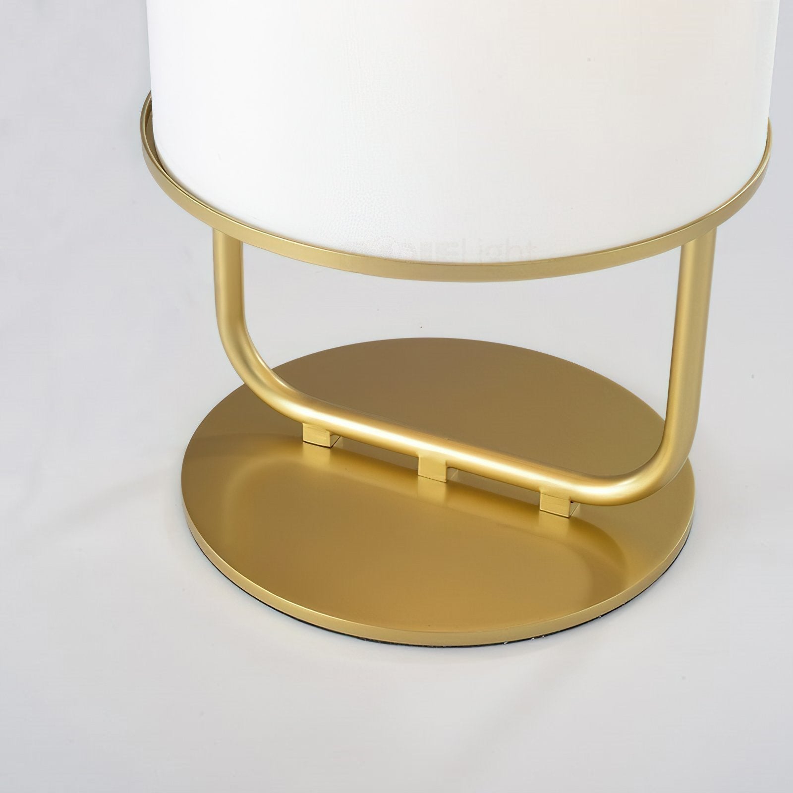 modern-minimalist-geometric-table-lamp-with-white-cloth-shade-and-gold-metal-base-for-elegant-interiors