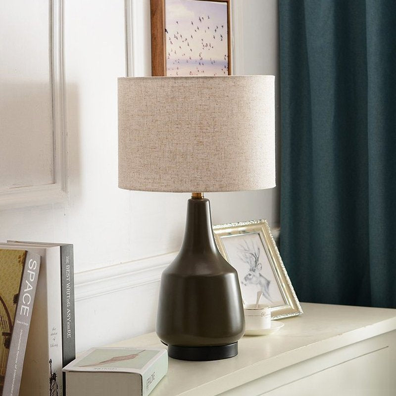 modern-cream-ceramic-table-lamp-with-cotton-fabric-shade-for-bedside-lighting
