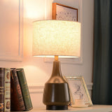 modern-cream-ceramic-table-lamp-with-cotton-fabric-shade-for-bedside-lighting