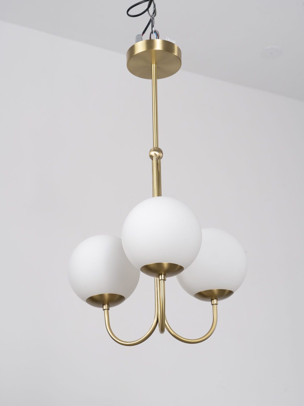 mid-century-modern-triple-angle-brass-pendant-lamp-with-opal-glass-globe-shade